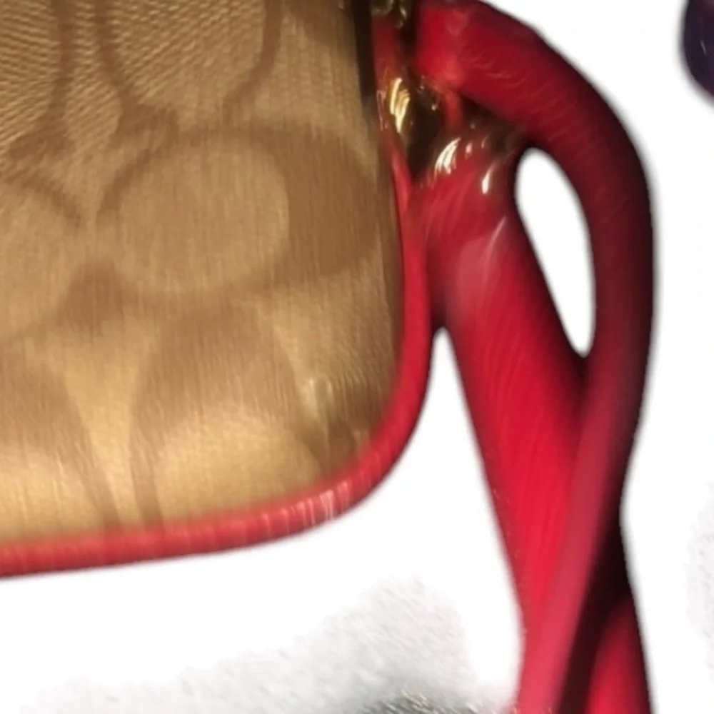 Coach red monogram large zip accordion style wallet with wrist strap